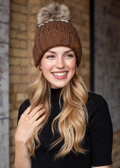 This item is in stock and ready to ship! Also available for local pickup from Magnolia, TX. Spend over $99 and shipping is on me! This beautiful brown and cream color block beanie with a black stripe is sure to make any outfit pop this winter! It features a knit fleeced lined style with a faux pom accent. The neutral colors will make it easy to pair with your winter wardrobe! One size fits most. White Beanies, Sweater Layering, Winter Hair Color, Cozy Scarf, Pom Pom Hat, Hair Color Trends, Pom Beanie, Fur Pom Pom, Knit Hat