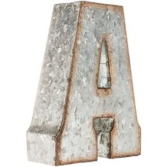 an old metal letter is shown on a white background and it looks like it has been made out of cement