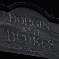 a sign that says borchin and burkies on the side of a building