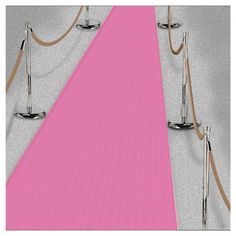 a pink carpet with rope and poles on it