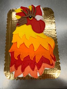 there is a cake shaped like a rooster