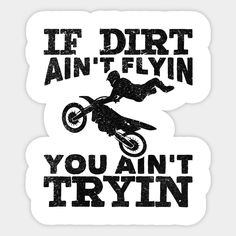 a dirt bike rider is doing tricks on the back end of his bike, and it says