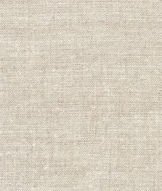 an upholstered fabric textured with white linen