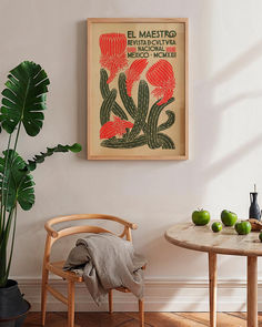 a table with some fruit on it next to a potted plant and a chair