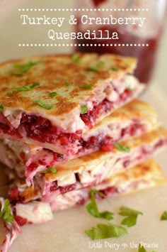 turkey and cranberry quesadilla is stacked on top of each other