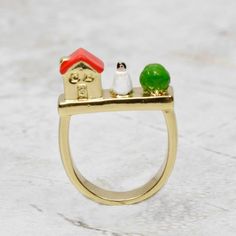 Show off your love for fairy tales with this enchanting Snow White Ring! Coco and Duckie thoughtfully curated this art piece that was lovingly crafted by truly imaginative artisans in Paris. Be unique by adding this fun ring to your jewel box! • Size 6, 18k gold plated• Clean with a soft jewelry polishing cloth. Never clean with any chemicals, chlorine or bleach.• Handmade in Paris Want to see more from N2 Paris? Click here! Gold Enamel Ring For A Gift, Gold Enamel Ring Perfect For Gifting, Gold Enamel Ring Perfect For Gift, Hand Painted Gold Enamel Rings, Hand Painted Enamel Gold Rings, Gold Enamel Hand Painted Rings, Enamel Yellow Gold Rings For Gift, Yellow Gold Enamel Rings For Gifts, Whimsical Gold Wedding Rings