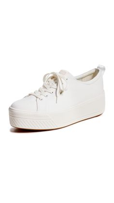 PRICES MAY VARY. Canvas upper Lightweight lace-up platform sneaker Lace-to-toe upper for an adjustable width Soft, breathable canvas lining 10% recycled PU foam Softerra footbed Classic White Canvas Shoes With Laces, Keds Shoes High Tops, Embroidered Keds Sneakers, Keds White Sneakers, White Keds 80s, White Leather Keds, Blue Label, Platform Sneaker, Lacing Sneakers