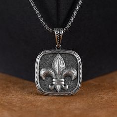 Handmade Fleur De Lis Custom Silver Necklace, French Men Necklace, Medieval Jewelry, New Orleans Charm, French Royalty, Anniversary Gift  ✅ Beautifully crafted pendant  ✅ High-quality materials for durability  ✅ Detailed and intricate design pendant necklace  ✅ Makes a thoughtful gift for someone special    ★Item Details  * Gender: Male / Female  * Material: 925 Sterling Silver  * Finish: Oxidized / Polished / Gold Plated  * Pendant Weight: 9.25 - 10.25 Grams  * Pendant Diameter: 0.98 x 0.98 Inc French Men, French Royalty, Medieval Jewelry, Intricate Design, Men Necklace, Anniversary Gift, New Orleans, Thoughtful Gifts, Solid Gold