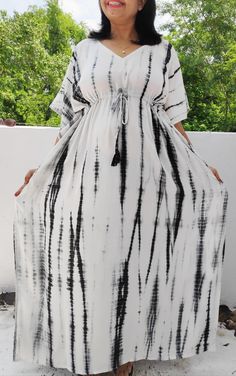 "Kaftan , Maxi dress, Cotton caftan, Beach cover up, Maternity Robe, Swimsuit Cover up, Plus size clothing, Sleep wear , Lounge wear , Oversized dress. The beauty of this kaftan is It is one of a kind ....fairly free in size so check the measurements below and go with your dream .. The beauty of this kaftan is - Gray- black and white shibhori Indian hand tie-dyed. - Armhole-22 inches around - - soft skin friendly cotton. - Length- - 55 inches Neck- front V neck- 9 inches . Side slits-13 inches. Long Kaftan Dress, Kaftan Designs, Cotton Caftan, Mode Kimono, Kaftan Maxi Dress, Long Kaftan, Cotton Kaftan, Sleep Wear, Oversized Dress