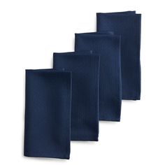 three navy blue napkins on a white background