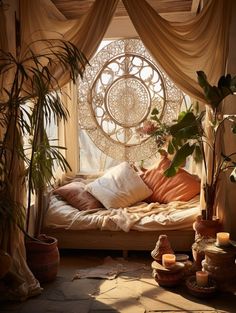 a bed sitting under a window next to a potted plant