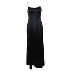 - Vintage Chanel black silk maxi dress from 1995 A/W collection. - Slim spaghetti strap. - Slim fit close to the body with A - shape bottom. - Backless with zip closure. - Size 42. - 100% Silk. Lining: 100% Silk. Black Bias Cut Maxi Dress With Spaghetti Straps, Formal Silk Maxi Dress With Spaghetti Straps, Black Satin Floor-length Slip Dress, Full-length Satin Slip Dress For Evening, Full Length Satin Slip Dress For Evening, Silk Maxi Dress With Spaghetti Straps For Formal Occasions, Black Maxi Dress With Bias Cut And Spaghetti Straps, Black Maxi Dress With Spaghetti Straps And Bias Cut, Bias Cut Maxi Dress With Spaghetti Straps For Evening