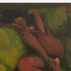 a painting of a naked man laying on a green couch