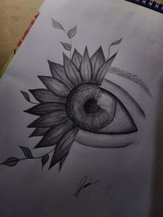 a drawing of a sunflower with an eye on it