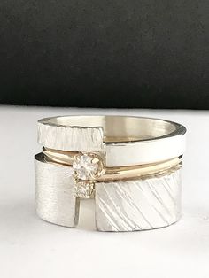 Happy Choices Stacking Rings by Dagmara Costello (Gold, Silver & Stone Ring) | Artful Home Gold And White Gold Rings Together, Silver And Gold Rings Together, Engagement Rings Without Diamonds, Wide Band Wedding Ring, Modern Diamond Ring, Contemporary Diamond Ring, Wide Diamond Bands, Wide Band Diamond Rings, Freeform Ring