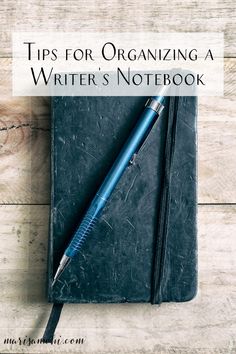 a notebook with a pen on top and the title tips for organizing a writer's notebook