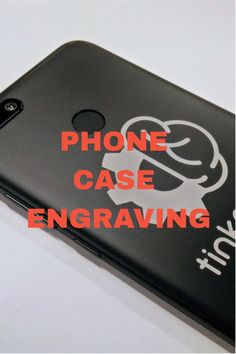 a cell phone with the words phone case engraving in red and white lettering on it