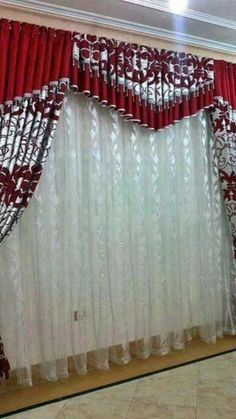 the curtains in this room are red and white