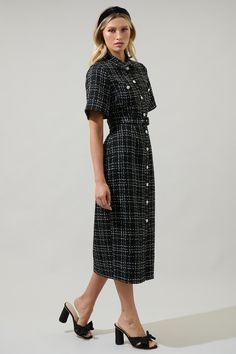 If there's one thing, we love to see in our close it is the Brook Tweed Button Down Midi Dress! A collared neckline and short sleeves frame this button-down dress made of soft tweed fabric. A belt around the waist hugs around. Wear it with any black heels to match this dress. - Tweed- Belted- Button down- Pockets- Color: BlackSize + Fit - Model is 5'8" and wearing size XS- Measurements taken from size S - Chest: 17"- Length: 48 1/4" Fabric Self:100%Polyester, Lining:97%Polyester 3%Spandex Style Button Down Midi Dress, Lace Button, Tweed Dress, Tweed Fabric, Strapless Mini Dress, Button Down Dress, Black Midi Dress, Black Heels, Dress Making