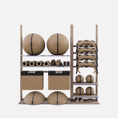 a shelf with basketballs and other sports equipment on it's shelves, all stacked up against each other