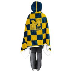 the michigan wolverines hooded blanket is shown in yellow and blue checkerboard pattern