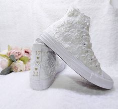 "Stunning bridal Converse, embellished with romantic ribbon lace for your perfect day, Personalised wedding shoes for the wedding day and beyond. Custom Converse with the option to add a perfectly colour matched ribbon. - Upper piece of durable canvas fabric - Classic toe cover made of cast rubber sole - All Star logos on the back of the sole and the inside - They are tied at the highest point of the shoe, flattening the foot inside the shoe Styles explanation : 1.Lace Converse : The model from Luxury Converse High-top Sneakers, Luxury Lace-up Converse High-top Sneakers, Luxury Converse Lace-up High-top Sneakers, Luxury High-top Canvas Sneakers With White Sole, Luxury Canvas High-top Sneakers With Rubber Sole, Luxury Canvas High-top Sneakers With White Sole, Nike Luxury High-top Sneakers, Wedding Converse Bride High Top, Bride Converse Shoes High Top