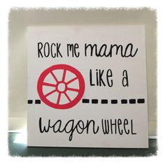 a sign that says rock me mama like a wagon wheel