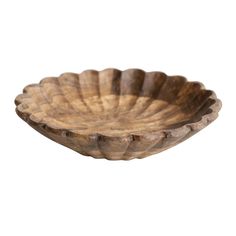 a wooden bowl on a white background