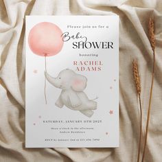 an elephant holding a pink balloon on top of a white sheet with the words bridal shower