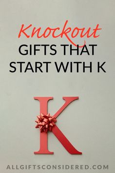 the letter k is made up of red paper and has a bow on it's side