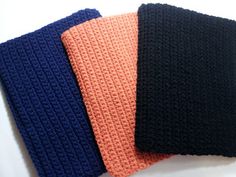 three crocheted headbands sitting next to each other