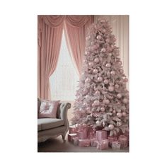 a pink christmas tree with presents under it