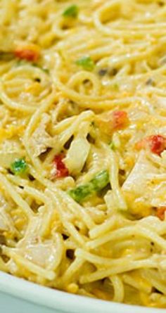 a close up of a pasta dish in a white bowl