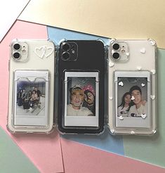 three cell phones with pictures on them sitting next to each other in front of a colorful background