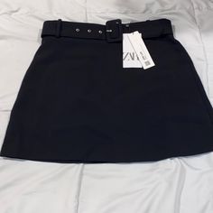 Zara Black Mini Skirt Black Belted Skirt For Party, Black Belted Skirt For Night Out, Black Belted Mini Skirt For Fall, Chic Black Belted Skirt, Chic Zara Skort With Relaxed Fit, Black High Waist Belted Skirt, High Waist Black Belted Skirt, Belted Black Mini Skirt For Workwear, Black Skort For Workwear