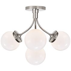 three light ceiling fixture with white glass globes on the bottom and chrome metal frame