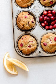 muffins with cranberries and orange zest in a muffin tin