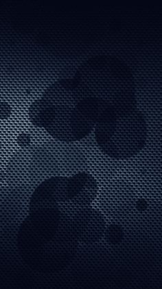 an abstract dark background with circles and dots