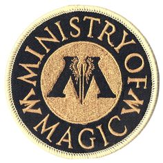 a black and gold patch with the words mmmmn's story of magic on it