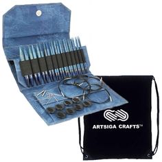 an artisan craft's kit with scissors and knitting needles in it on a white background