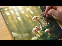 someone is painting mushrooms in the woods with acrylic paint on canvase paper