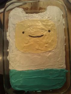 a cake in the shape of a smiling face