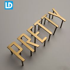 the letters are made out of wood and have been placed in different positions to spell them