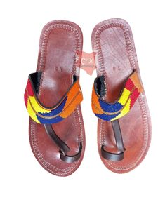 Beautifully made Male Sandal. Handmade from Leather and Beads all inspired by the Masai Tribe Men. Can be Personalized to your prefered colour. Available in all sizes Perfect Gift For Him. Shipping is via DHL express. Check out more sandals from our shop by clicking the link below. https://www.etsy.com/shop/CaribuKenya Masai Tribe, Tribes Man, Formal Necklace, African Shoes, Mens Shoes Sandals, Beaded Sandals, Cute Stars, Perfect Gift For Him, Mens Sandals