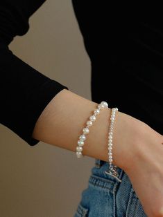 Elevate your wrist with timeless elegance through our Simple Elegant OT Pearl Silver Bracelet. This refined and versatile bracelet features a classic "OT" link design adorned with lustrous pearls, creating a piece that seamlessly blends sophistication with simplicity. Metal: Recycled Sterling Silver Plated On Brass Pearl: Freshwater Pearl 3-4.5mm/6-7mm Bracelet Length: 170mm/190mm Weight: 5-9g Edison Pearls, Link Design, Tiger Eye Stone, Simple Elegant, Recycled Sterling Silver, Silver Pearls, Pearl Bracelet, Ring Bracelet, Stone Necklace