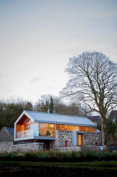 an image of a modern house in the evening