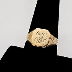 Antique Art Nouveau J.R.Wood & Sons(NYC,since 1850) 14k solid gold signet ring with I believe heavily scripted JC initials. The ring is a size 8 1/2 and it weighs 4.3 grams. The top of the ring measures 12mm(7/16") x 12mm(7/16"). The ring is in good condition with modest wear. The band remains in near perfect original round.  All floral engraved decoration on the sides of ring remain crisp and well defined as do signet initials. Stamped 14K along with Woods W maker's mark. Please enlarge all pics for best details. Vintage Engraved Initial Ring As A Gift, Victorian Initials Signet Ring For Anniversary, Vintage Initials Signet Ring, Vintage Monogram Signet Ring Gift, Victorian Gold Signet Ring With Initials, Antique Jewelry Rings, Gold Signet Ring, Antique Art, Jewelry Inspo