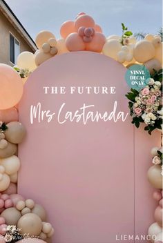 an arch with balloons and flowers on it that says the future mrs castanea