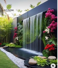 an outdoor garden with waterfall and flowers