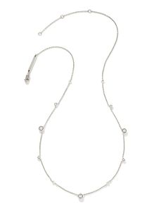 A delicate necklace adorned with moments of subtle sparkle. The Davie Sterling Silver Trio Strand Necklace in White Sapphire is an elevated layering piece designed to shine for years to come, featuring a minimalist design that’s perfect for everyday wear. Minimalist Single Strand White Gold Diamond Necklace, Minimalist White Gold Single Strand Diamond Necklace, Elegant Everyday Station Necklace With Satellite Chain, Elegant Station Necklace With Satellite Chain For Everyday, Modern White Gold Diamond Necklace With Delicate Chain, Dainty White Gold Station Necklace For Anniversary, Minimalist White Gold Necklace For Layering, Minimalist White Gold Necklaces For Layering, Minimalist White Gold Layering Necklaces